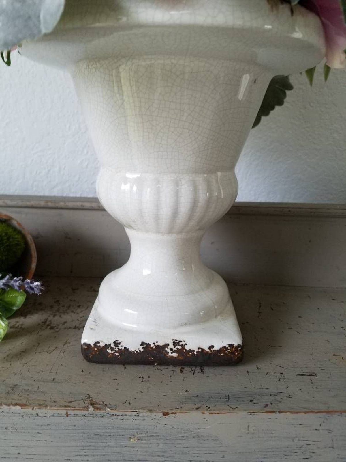 White Urn with faux flowers floral arrangement plants