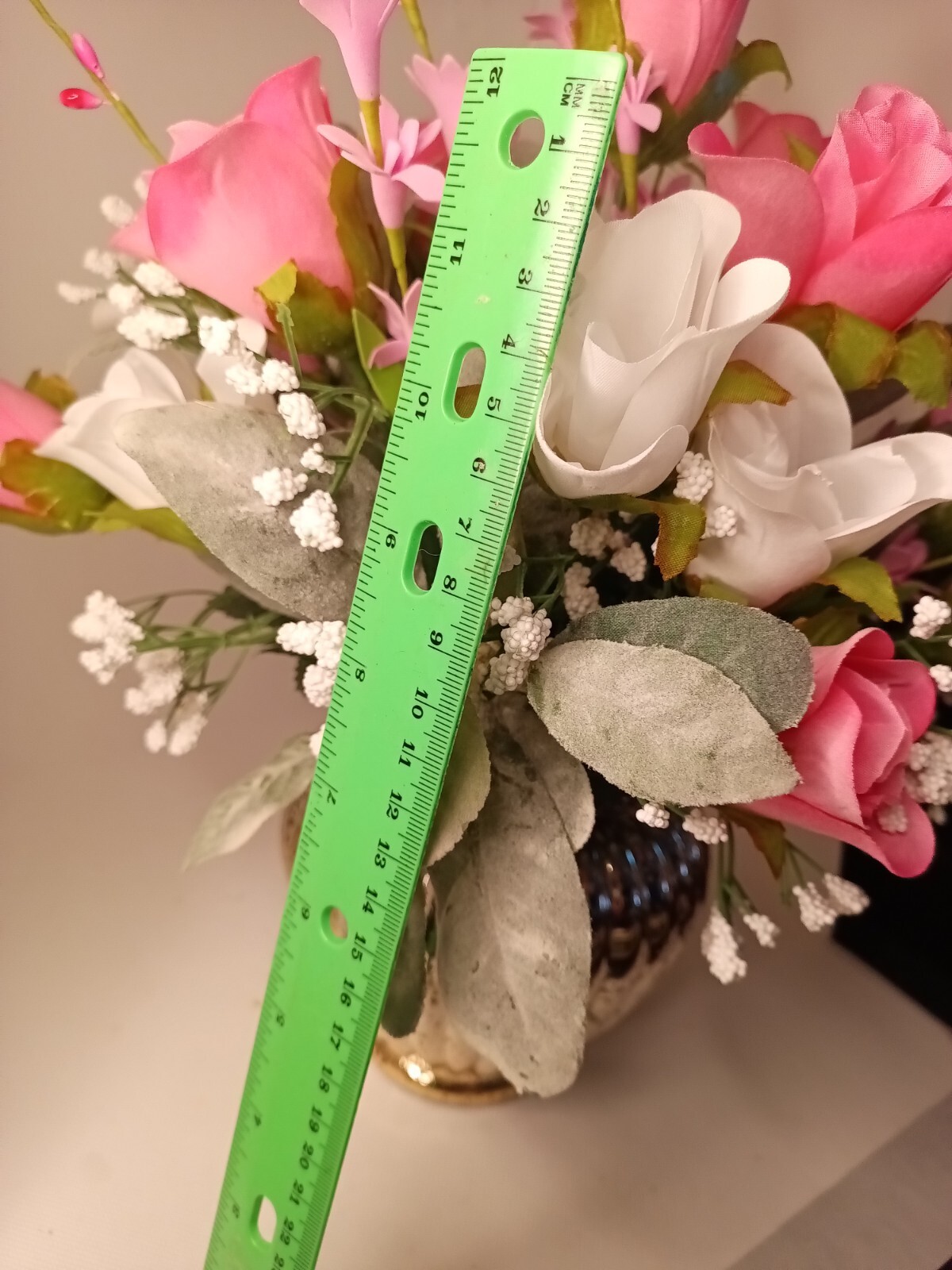 Beautiful Pink And White Floral Bouquet And A Silver Face Realistic Desk…