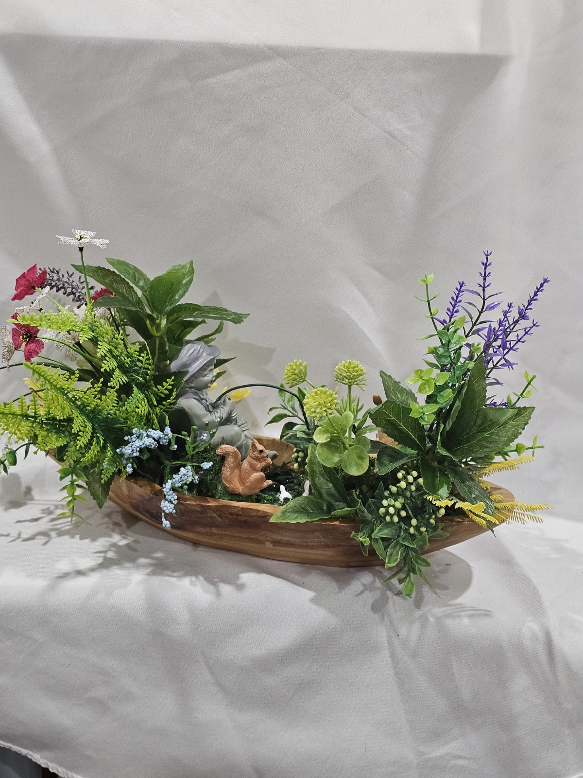 Artifical Flower Arramgement in woods, Boy Fishing Deer, Turtle Duck