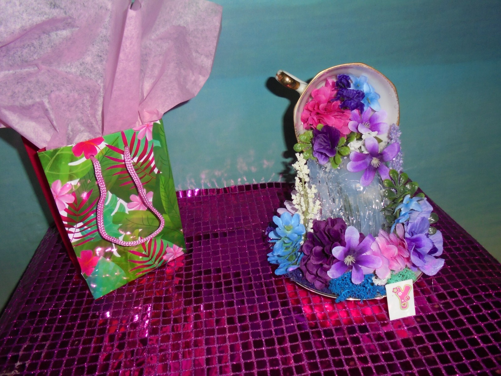 Floating Teacup floral arrangement Item # Y 
