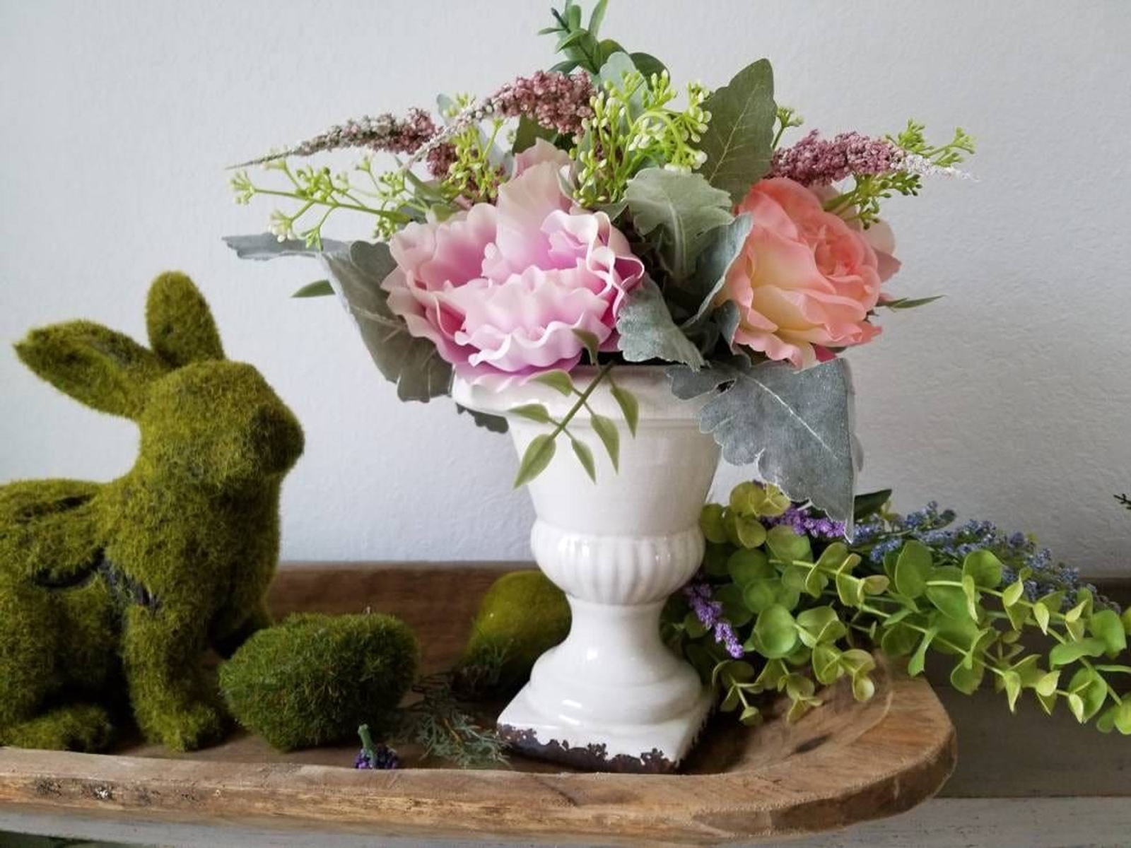 White Urn with faux flowers floral arrangement plants