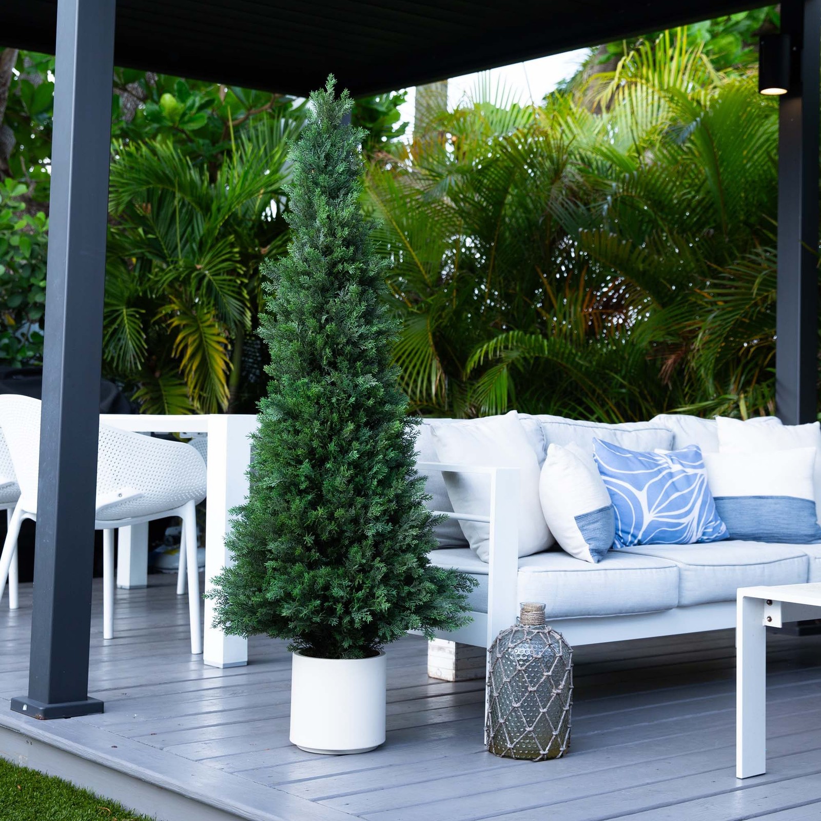 Nearly Natural 5ft UV Resistant Cedar Tree in White Planter in Green