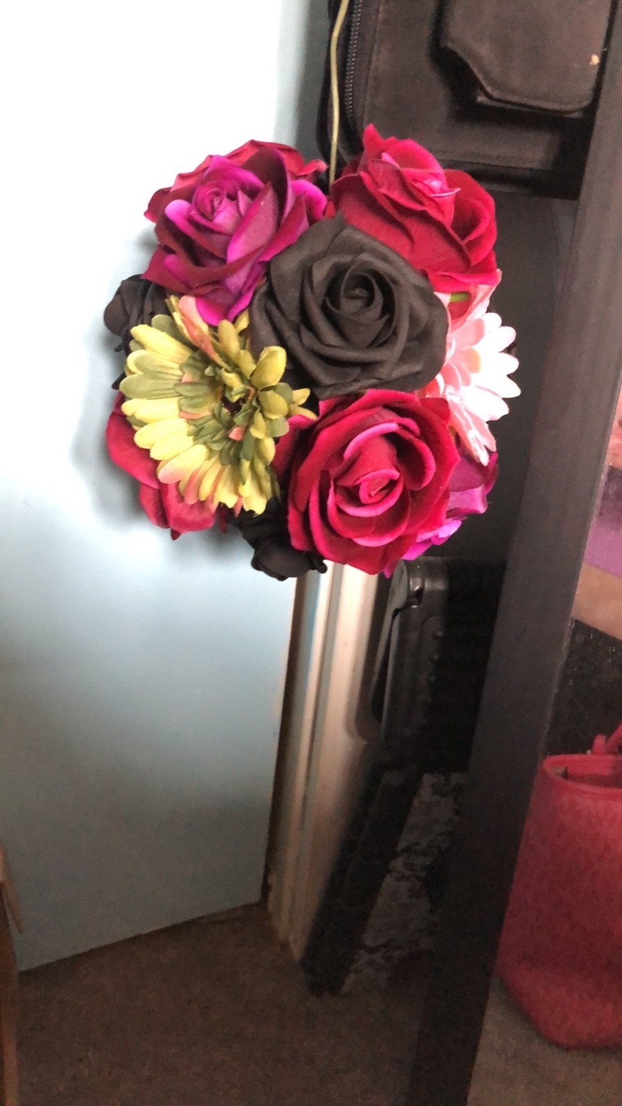 handmade flower balls artificial floral bouquet consisting of dark red, magenta,