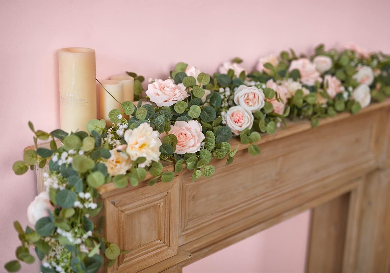 Artificial eucalyptus wreath with flowers, fake roses, and baby’s breath flowers