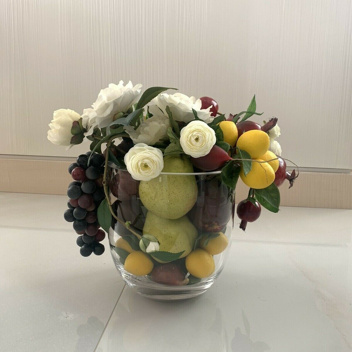 Pomegranate, Lemon, Grapes with Flower Centerpiece Arrangement with Clear Vase 