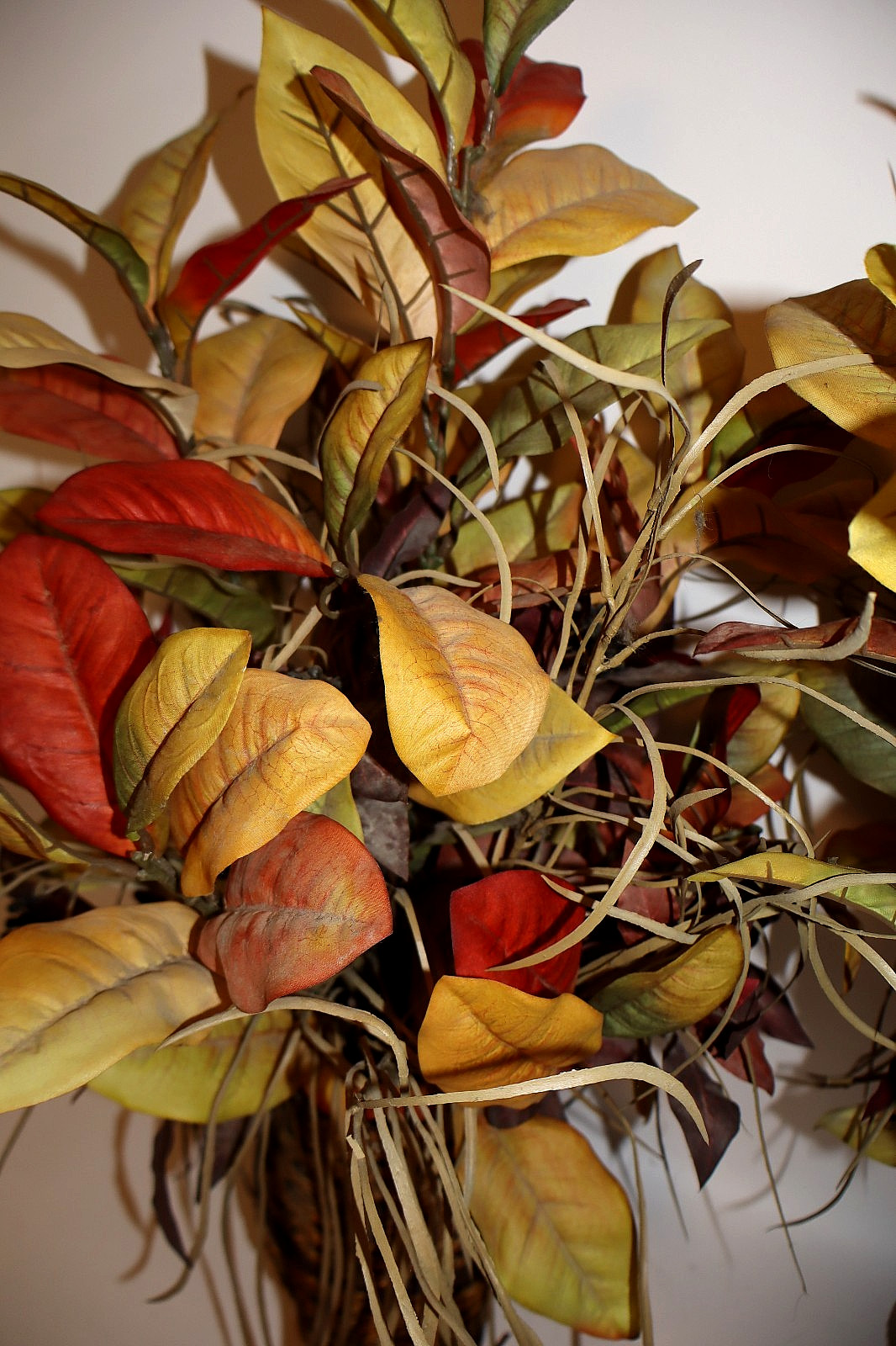Pair of High Quality 30″ tall Faux Foliage Arrangements in Woven Pottery Vases