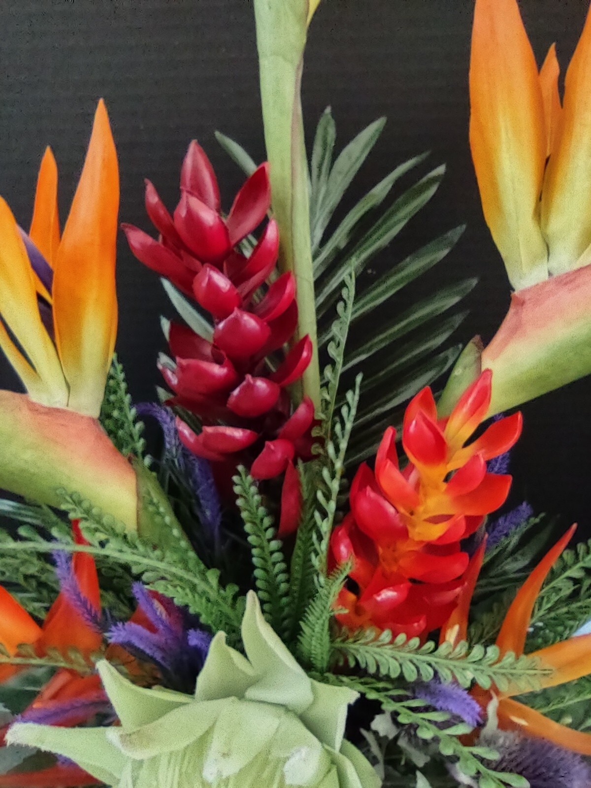 Artificia ltropical floral arrangement