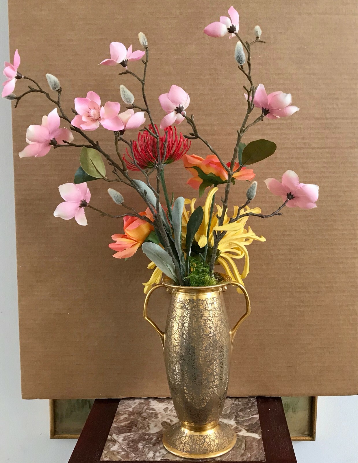 Floral Arrangement with Multi-Colored Silk Flowers in a Gold Colored Floral Vase