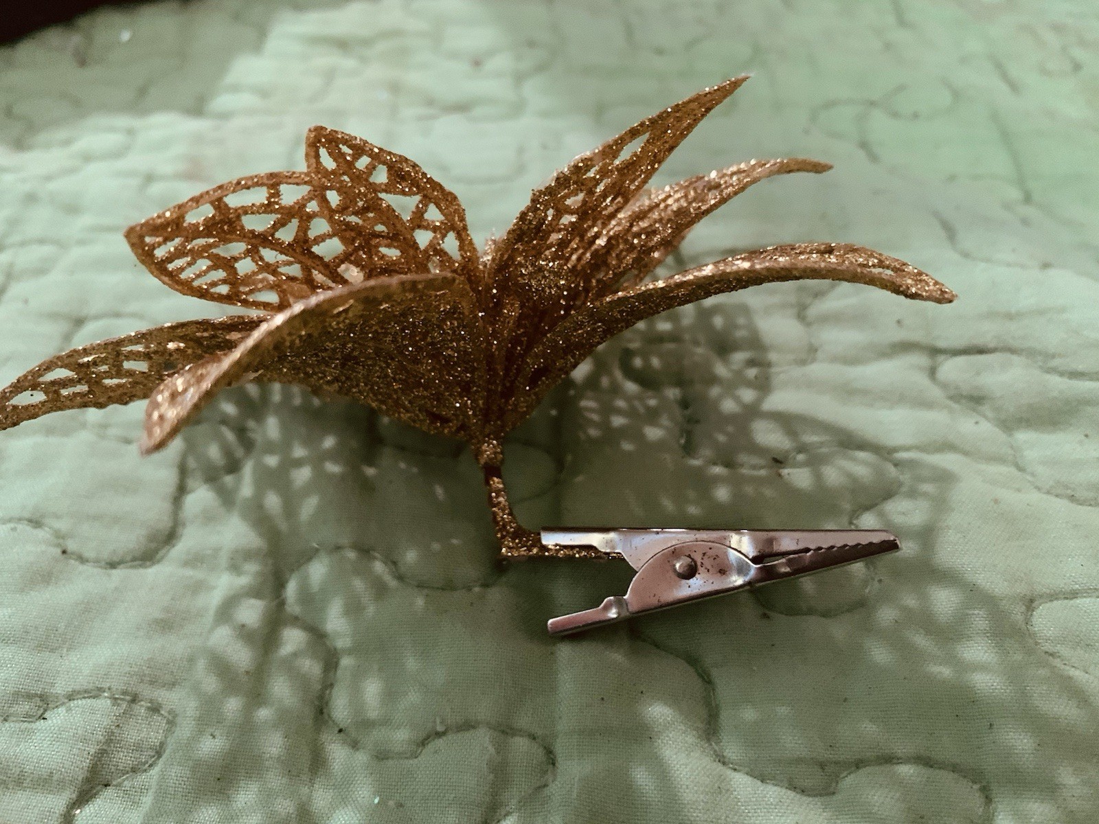 Clip On Artificial Gold Poinsettia