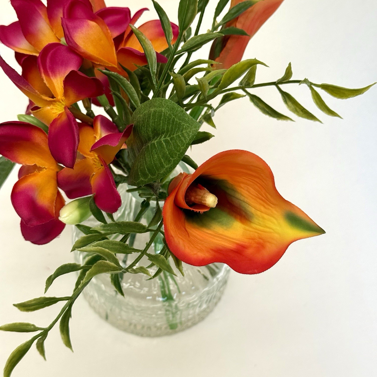 Artificial Tropical Flower Arrangement in Textured Glass Vase Pink Orange 10”