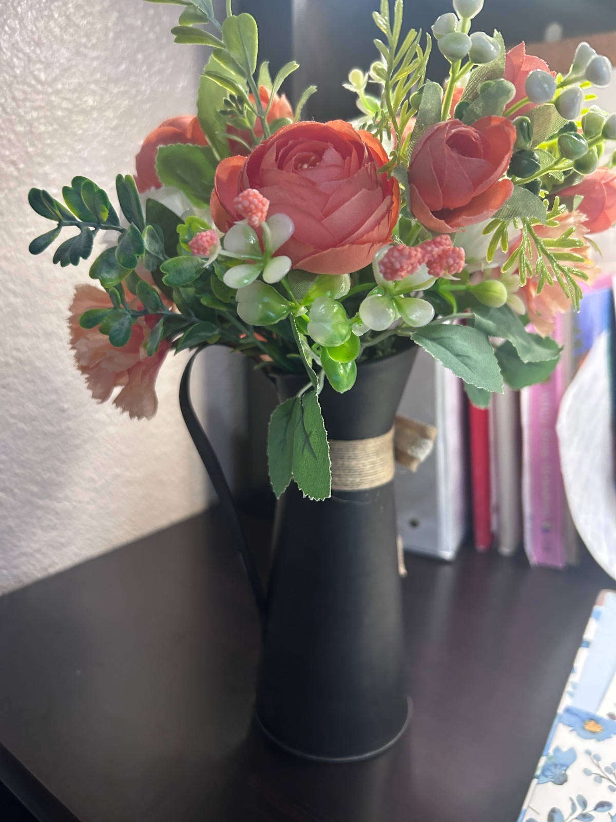 Handmade orange and white artificial flower arrangement