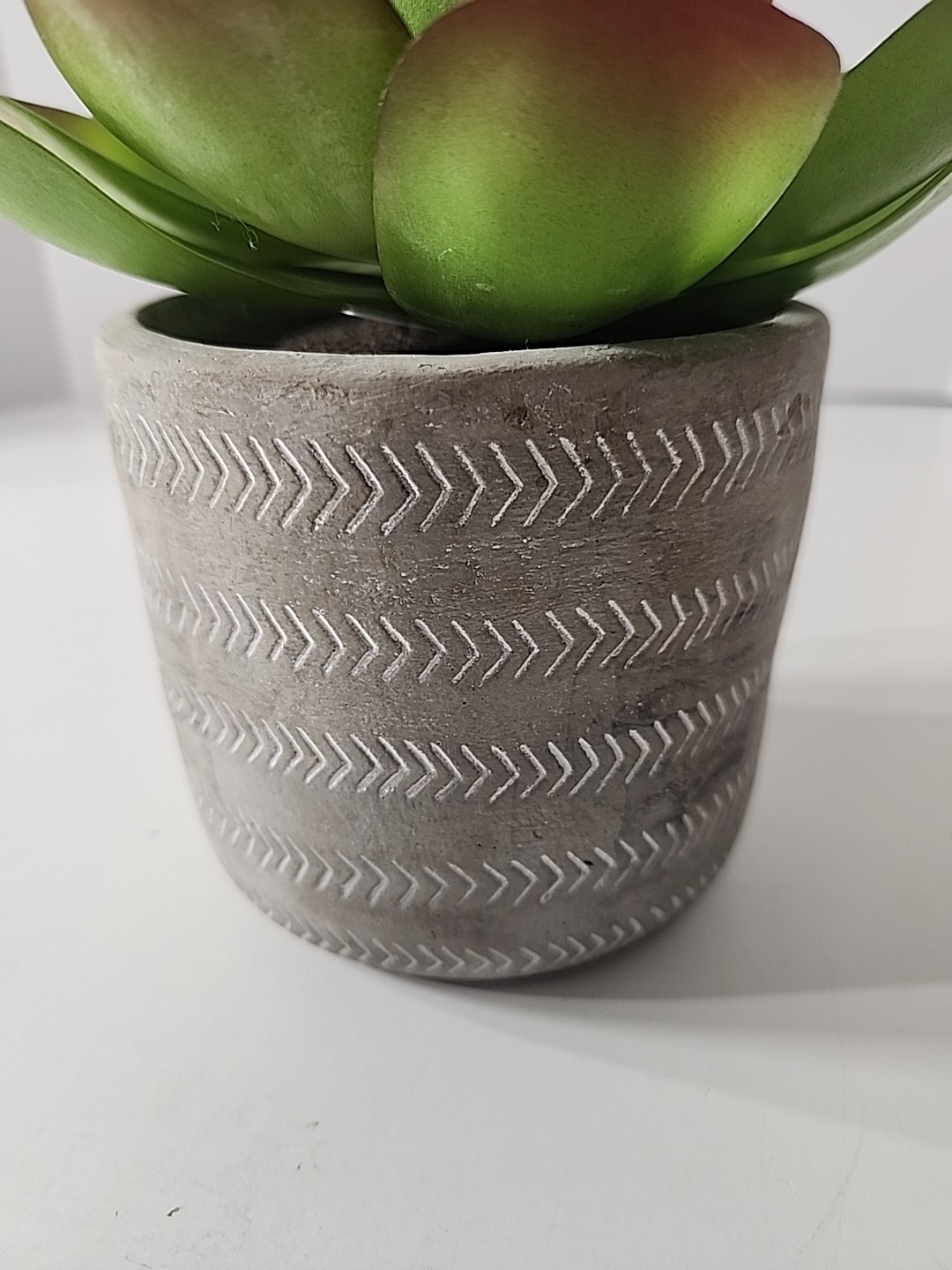 7.5 Inch Artificial House Plant In Decorative Stone Pot.