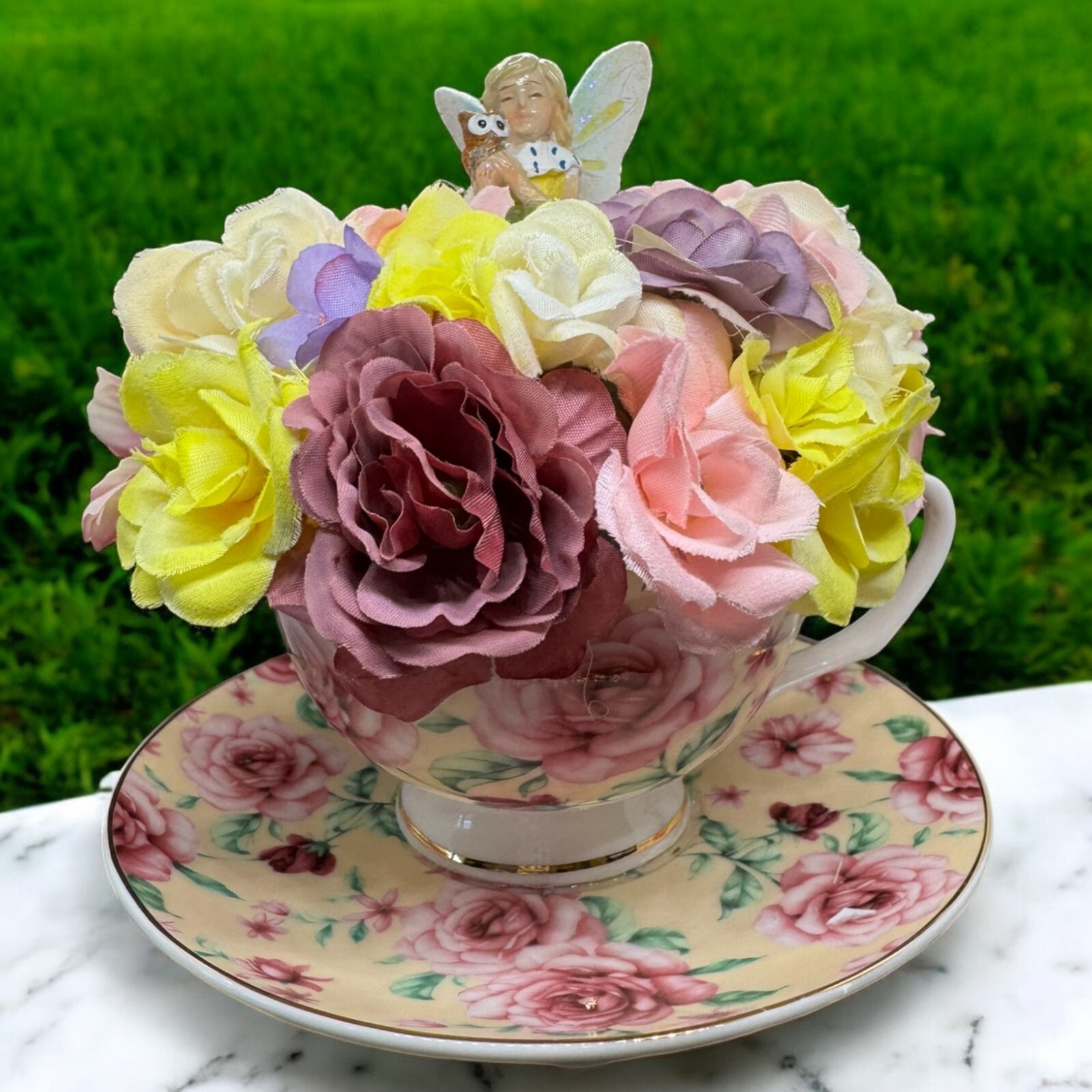 Pink Tea Cup Fairy Flower arrangement With Fairy