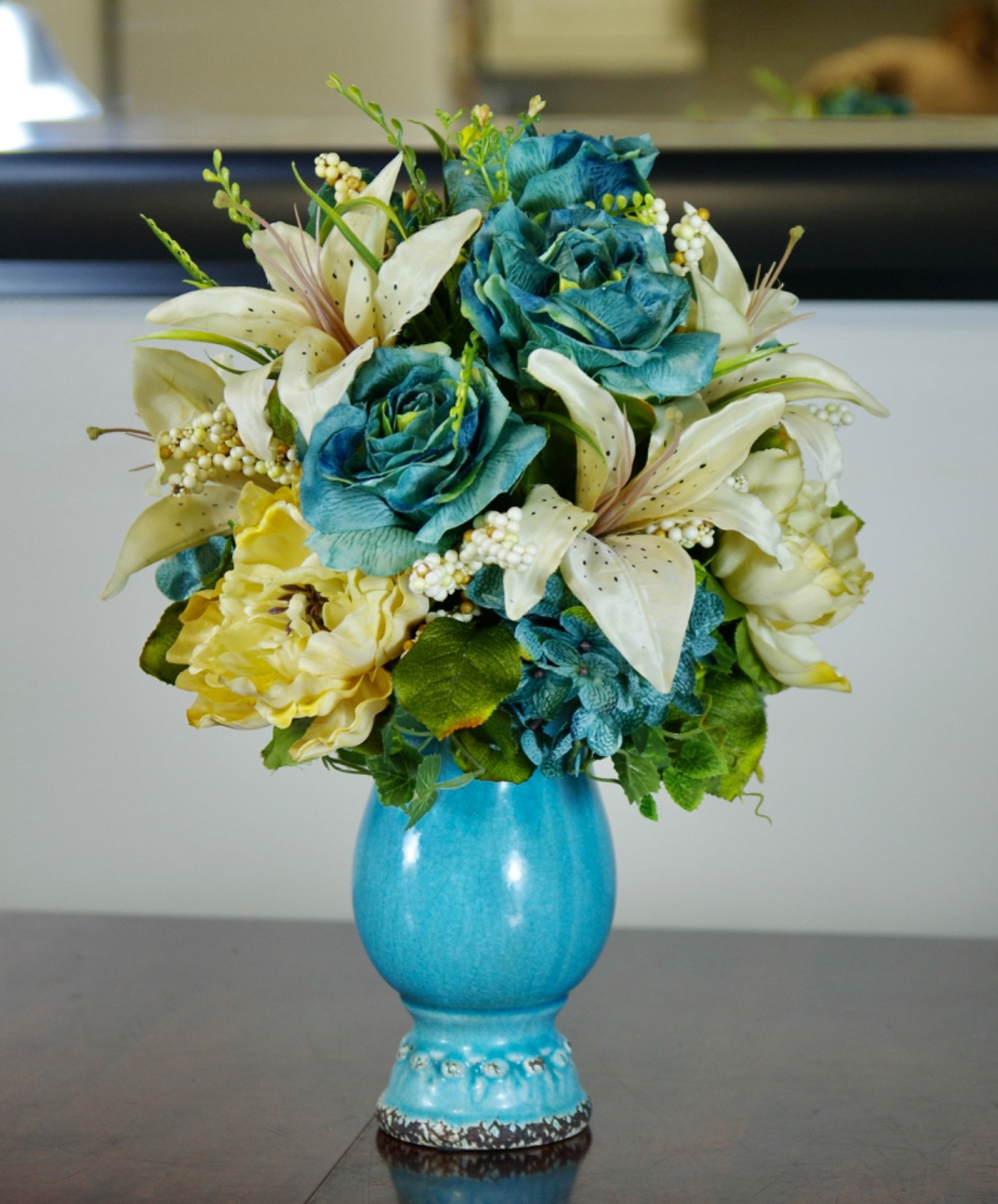 Silk Arrangement of Blue Roses, Hydrangeas and Beige Lilies in Blue Ceramic Vase