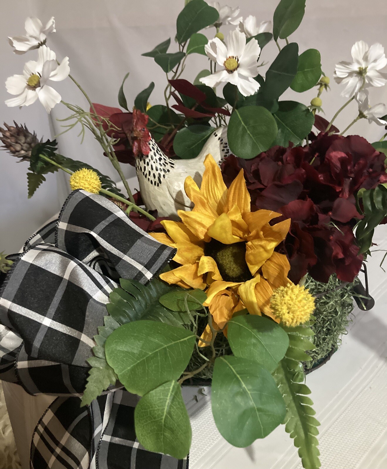 The Stately White And Red Rooster With White Cosmos And Yellow Sunflower