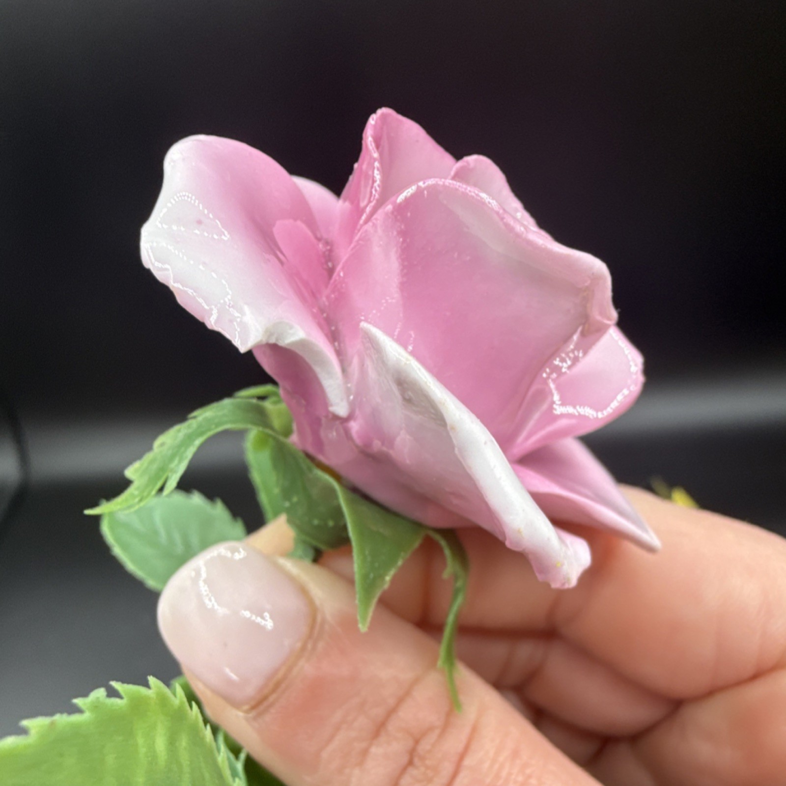 Porcelain flowers, pink roses with plastic stems and leaves