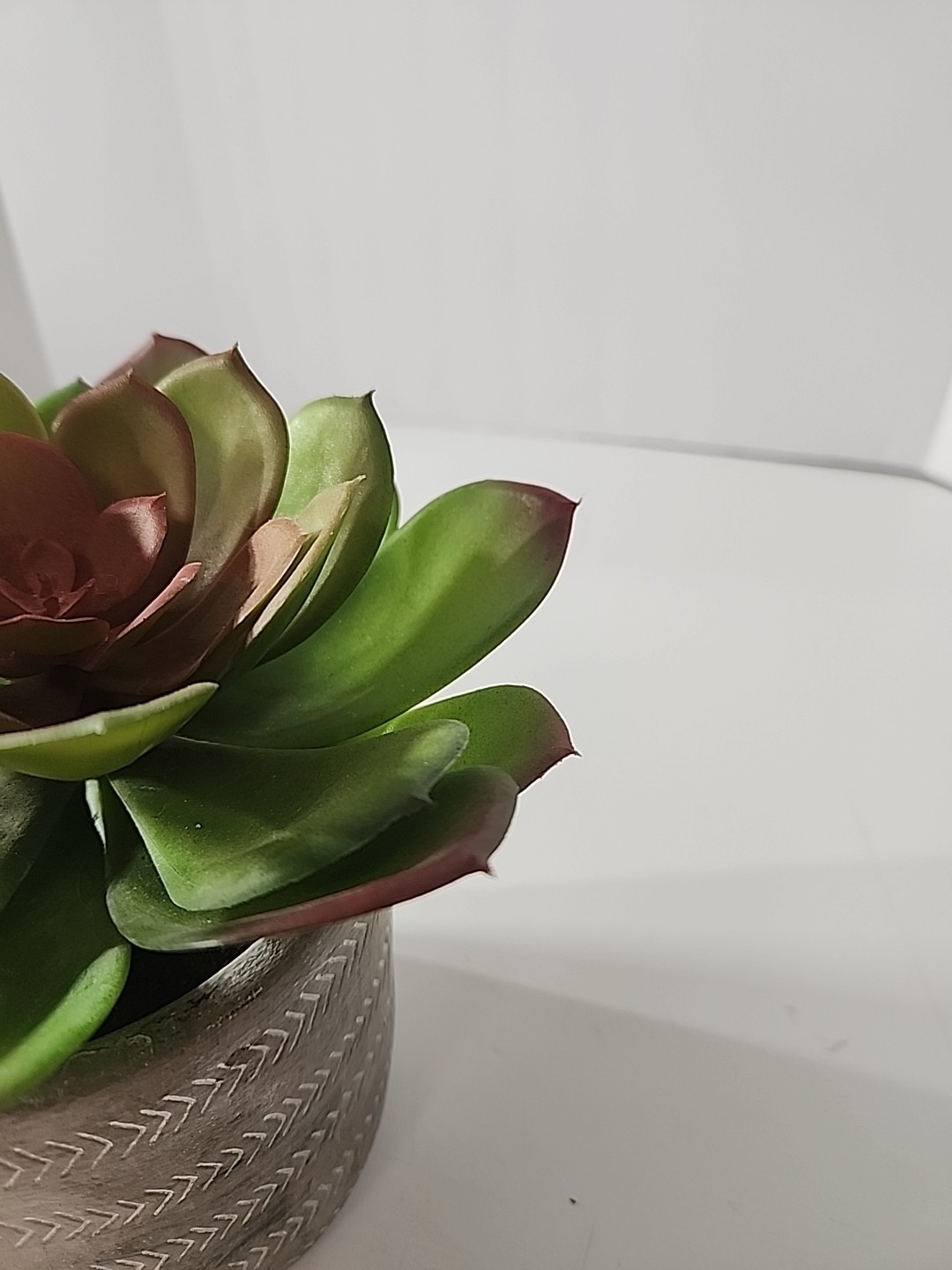 7.5 Inch Artificial House Plant In Decorative Stone Pot.