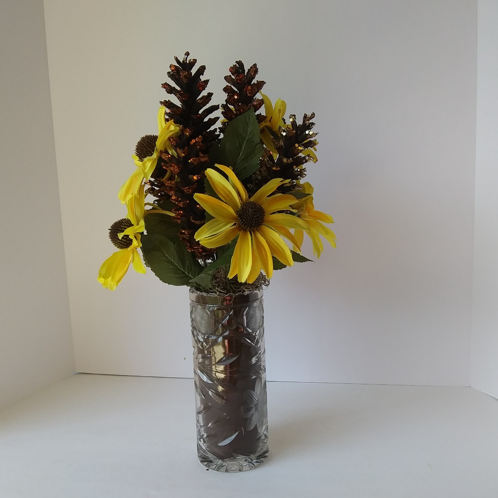 Artificial Yellow Sunflower & Pinecone Fall Arrangement in Cut Glass Vase Decor