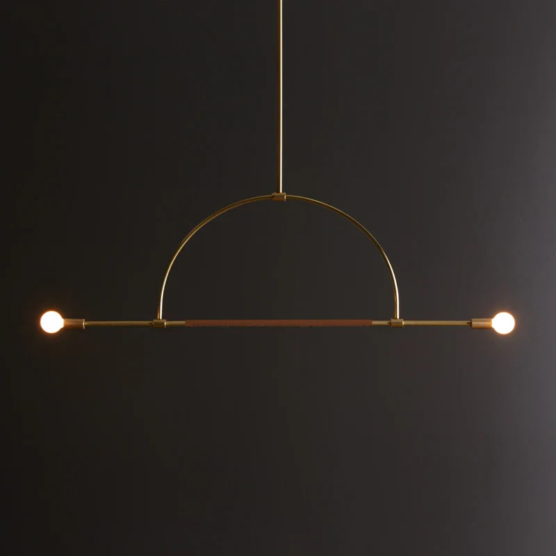 The Ellis Light is made from solid brass, with an optional leather wrap that is