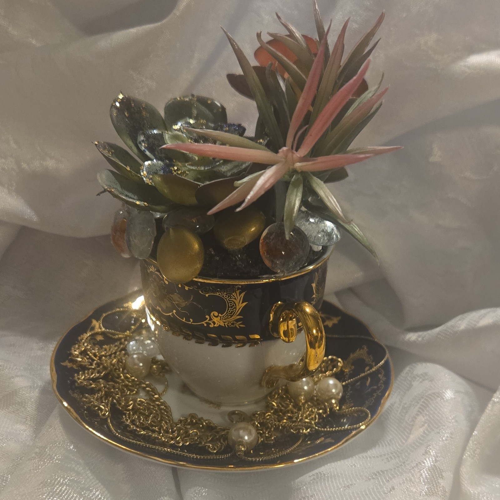 Artificial Succulent Floral Arrangement Ceramic Teacup & Saucer, Beads Chain