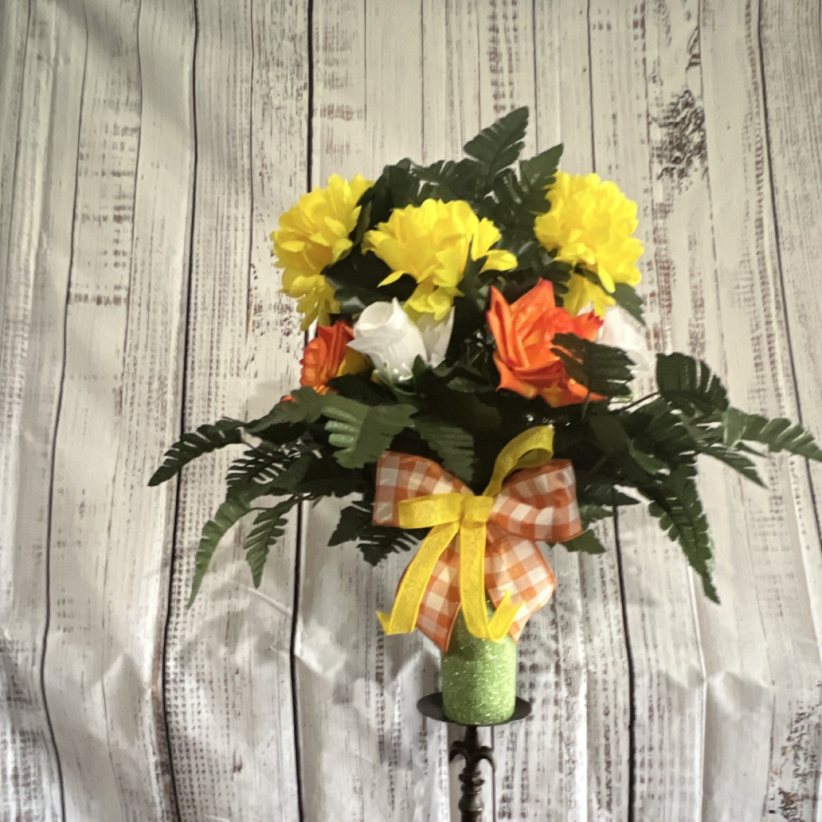 Cemetery vase insert with yellow, orange, white, and green florals