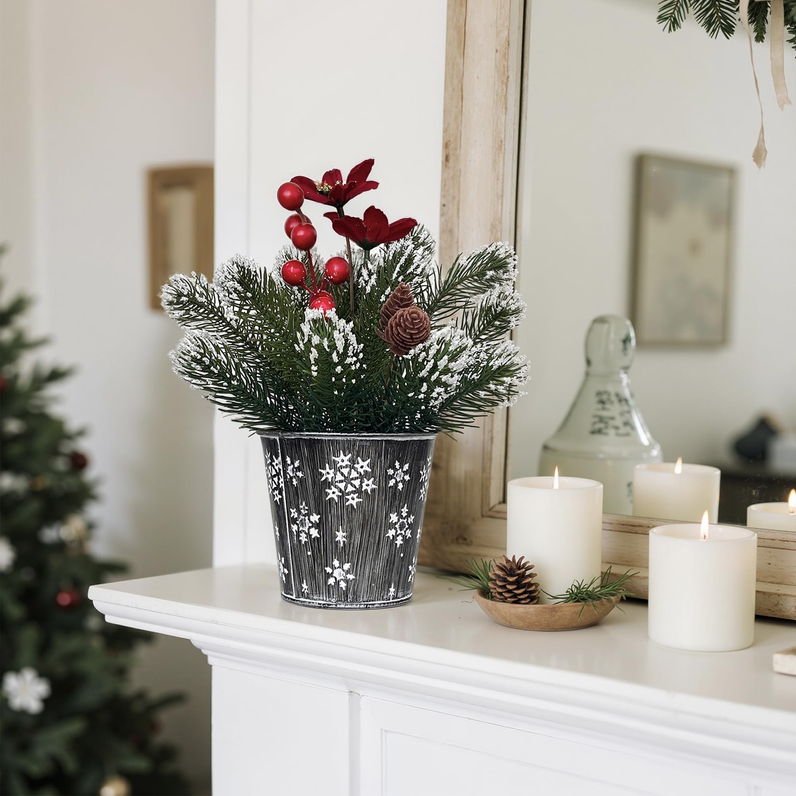 Potted Snowy Norfolk Pine Branches with Poinsettias Barries and Pin Cones