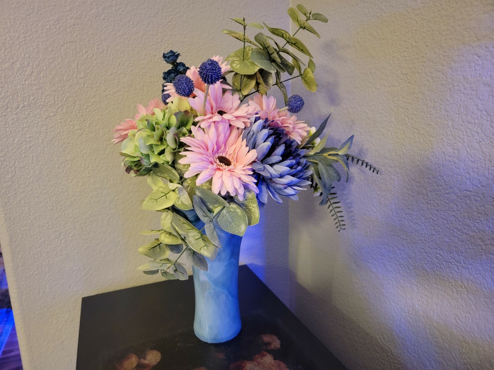 Mixed Artificial Floral Arrangement In a Murano light blue Vase