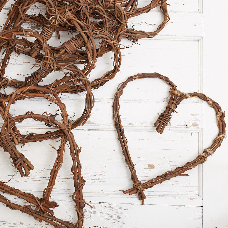 Bulk Package of 12 Natural Grapevine 12″ Heart Wreaths