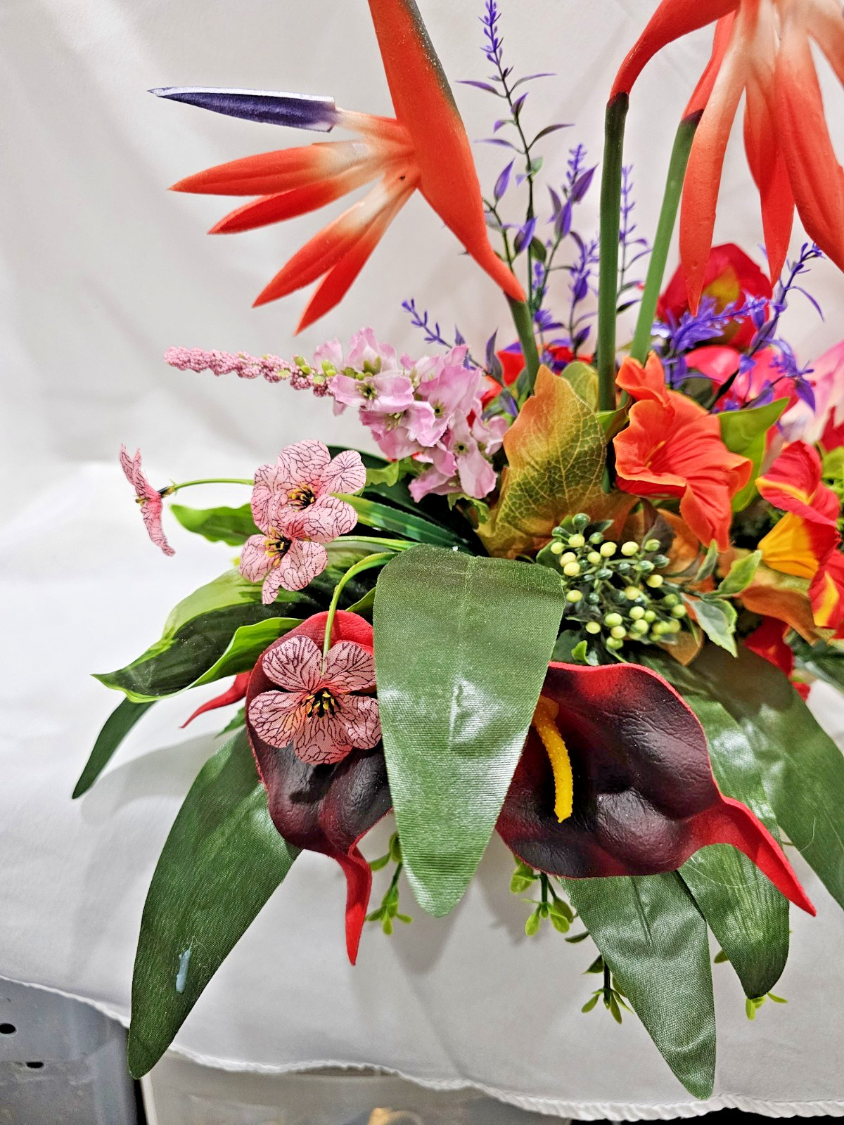 Bright Colors in this Artificial Tropical arrangement, Birds of Paradise etc.