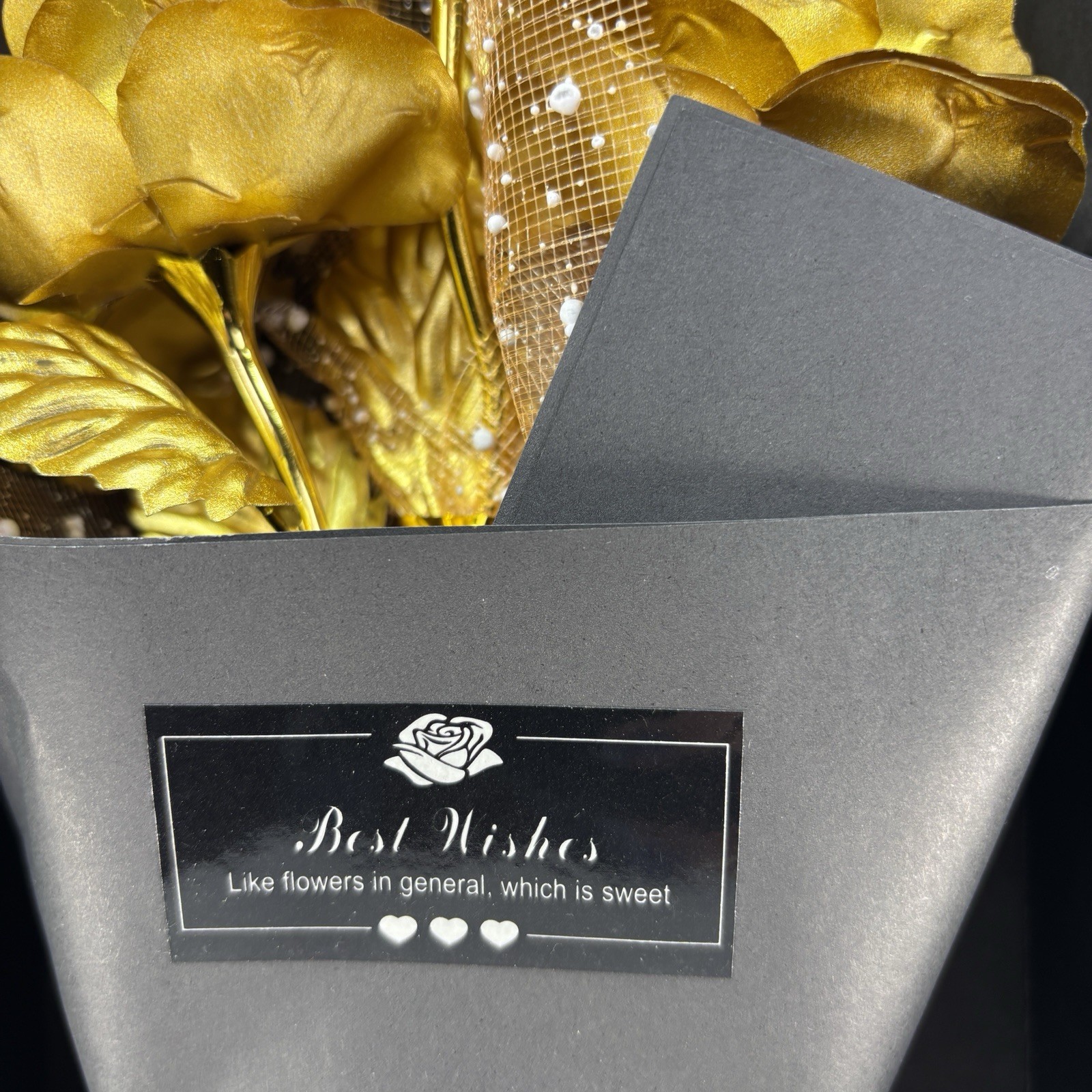 Gold-plated artificial rose bouquet in a black gift box