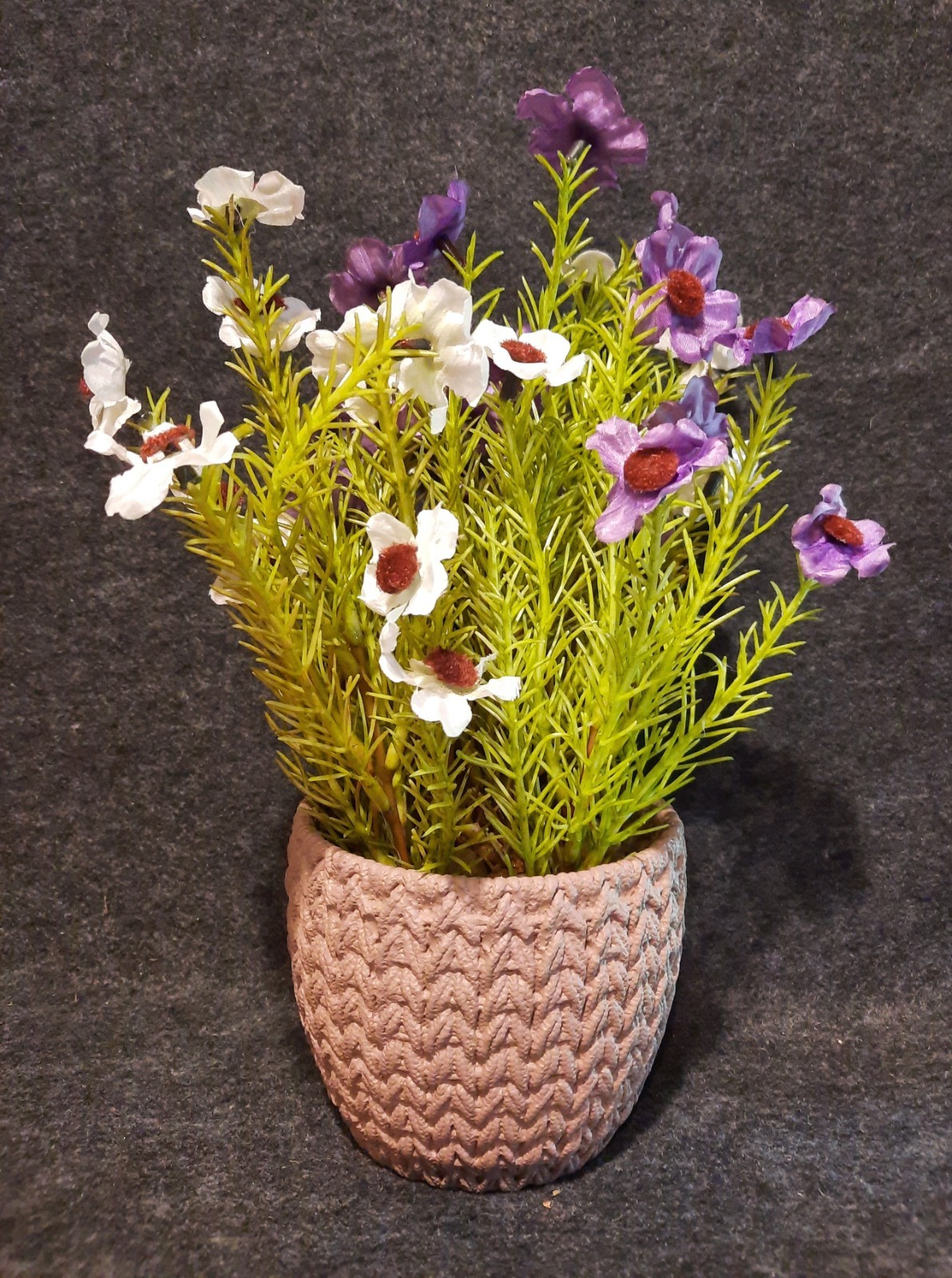 Dainty Faux Purple & White Flowers & Greenery In Woven Design Resin Flower Pot!