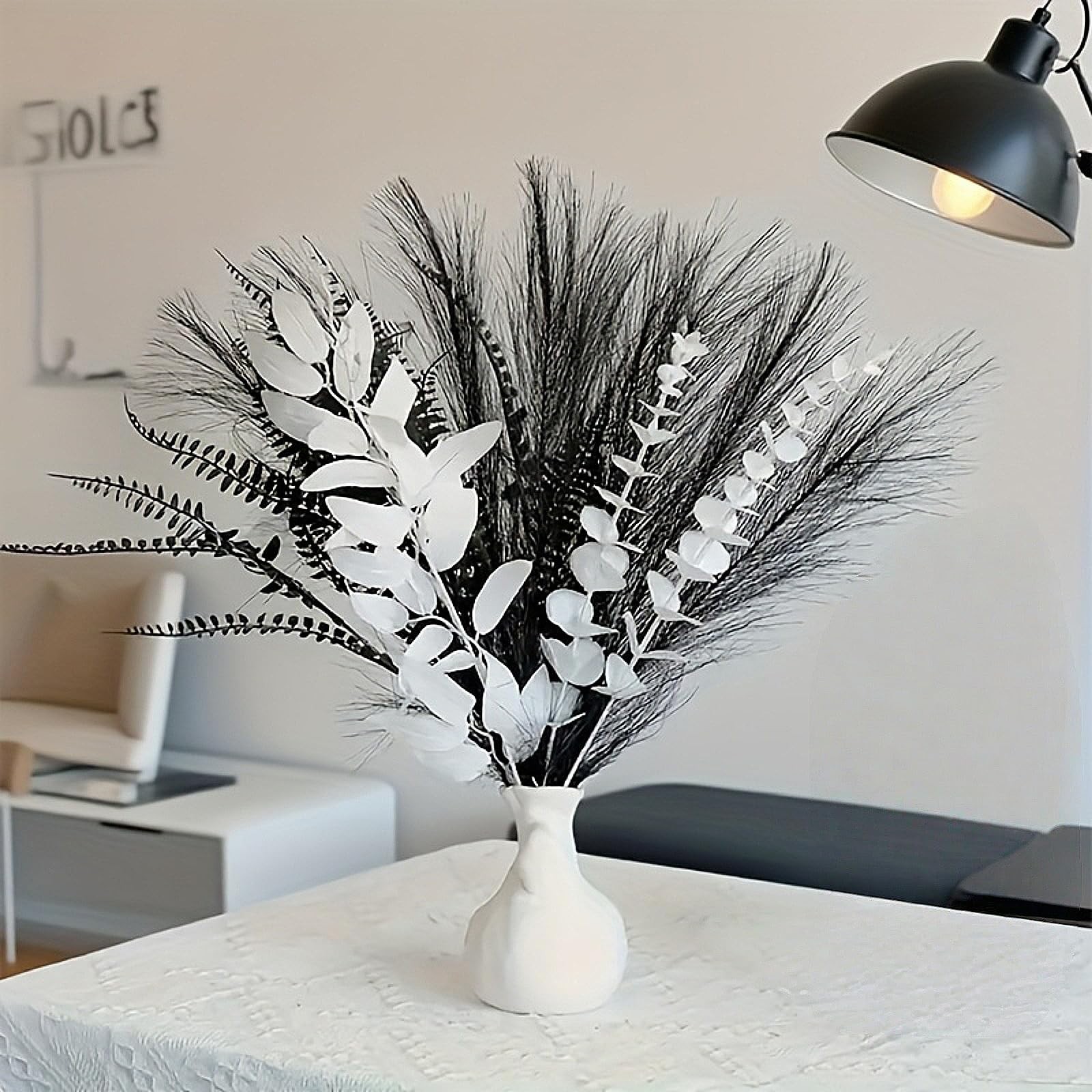 Black and white artificial bouquet in minimalist Nordic style, featuring arti…