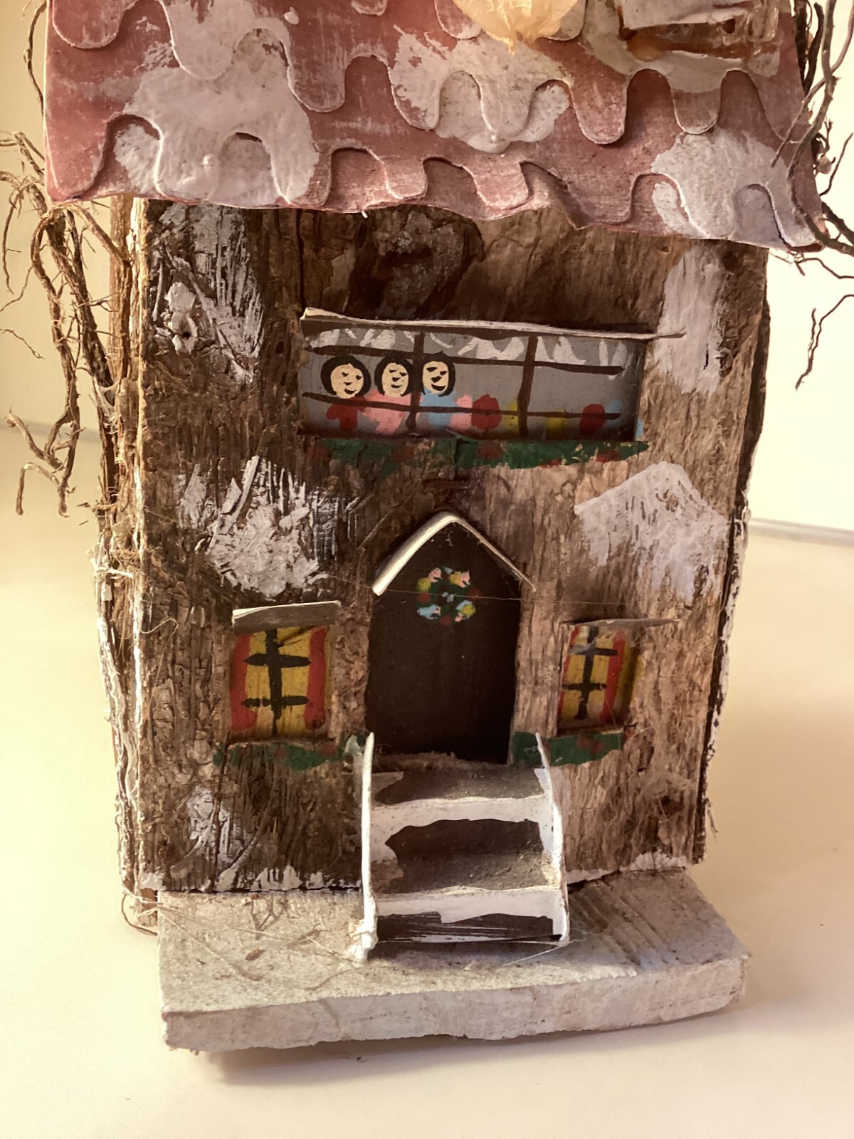Wood birdhouse centerpiece with dried flowers, turkeys, twigs, windows, chimney