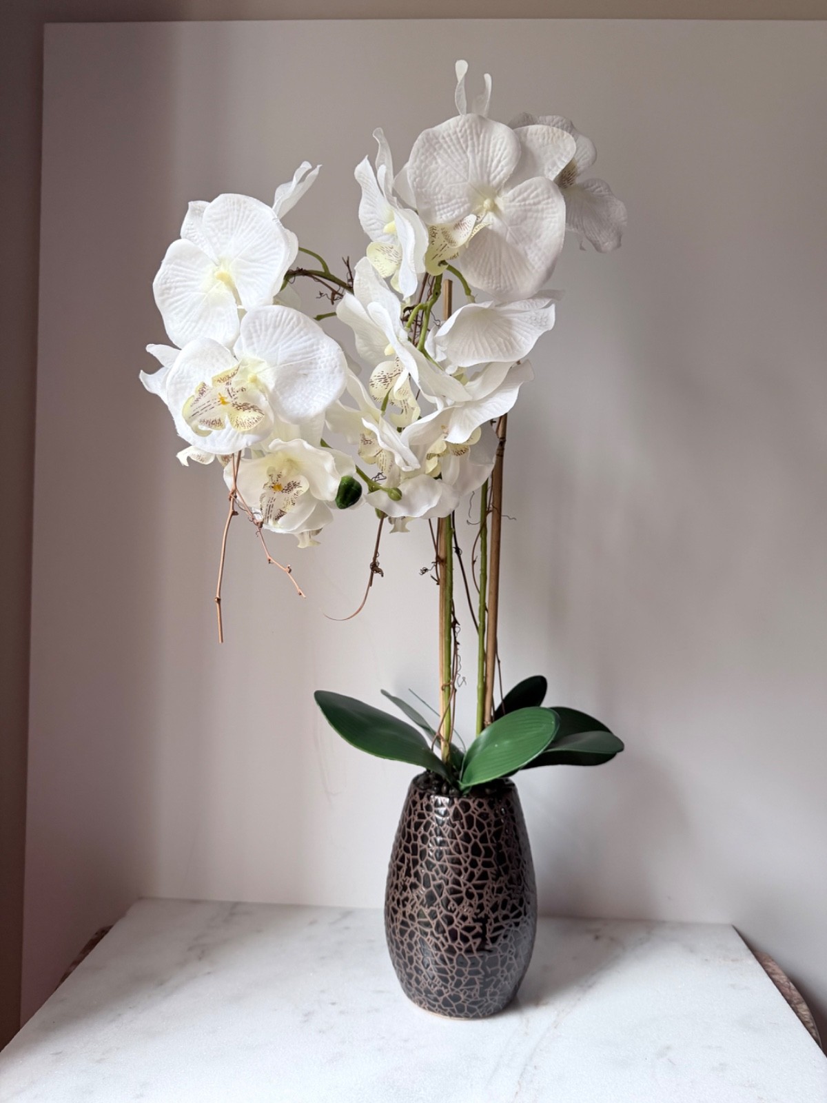 artificial white Phalaenopsis orchid arrangement in a brown textured vase 27”….