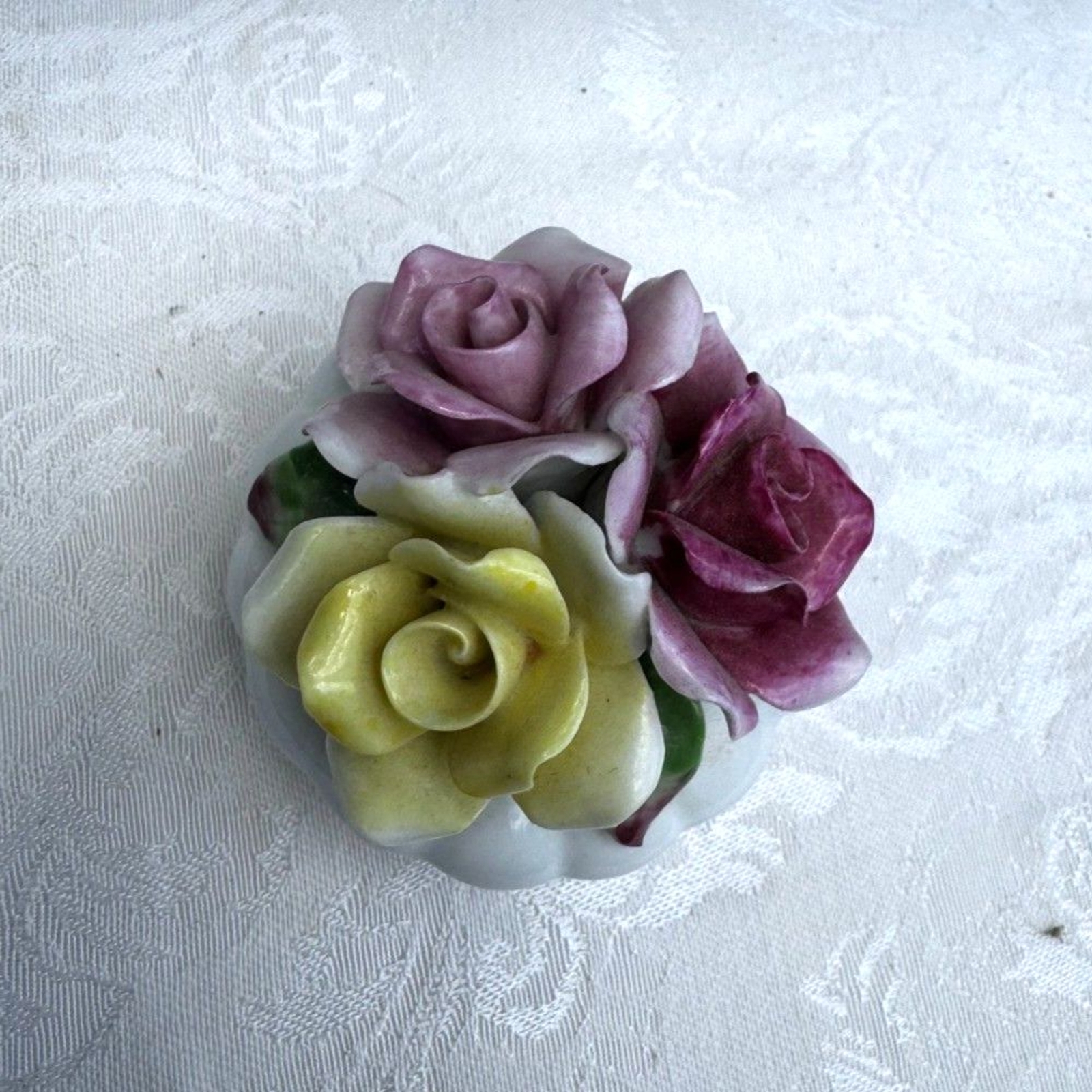Beautiful vintage bone china flowers in tiny vase red, yellow, pink roses