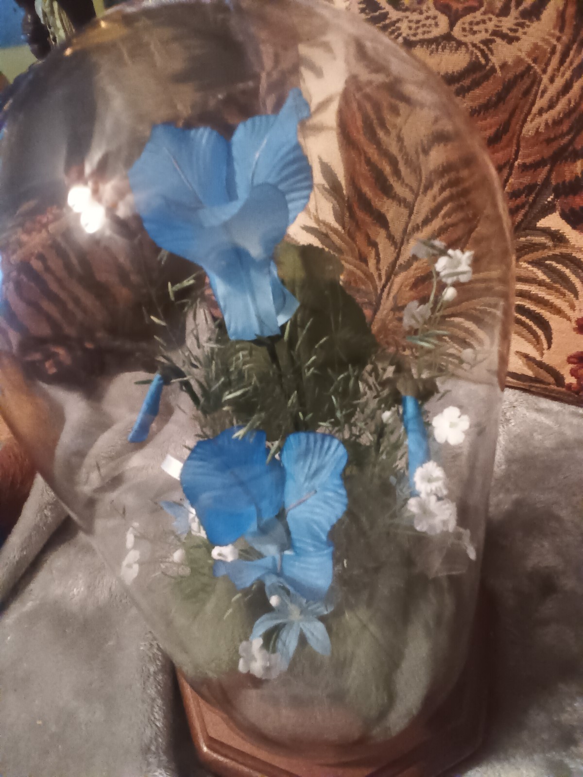 Glass dome blue,green and white artificial flower arrangement,wood base.