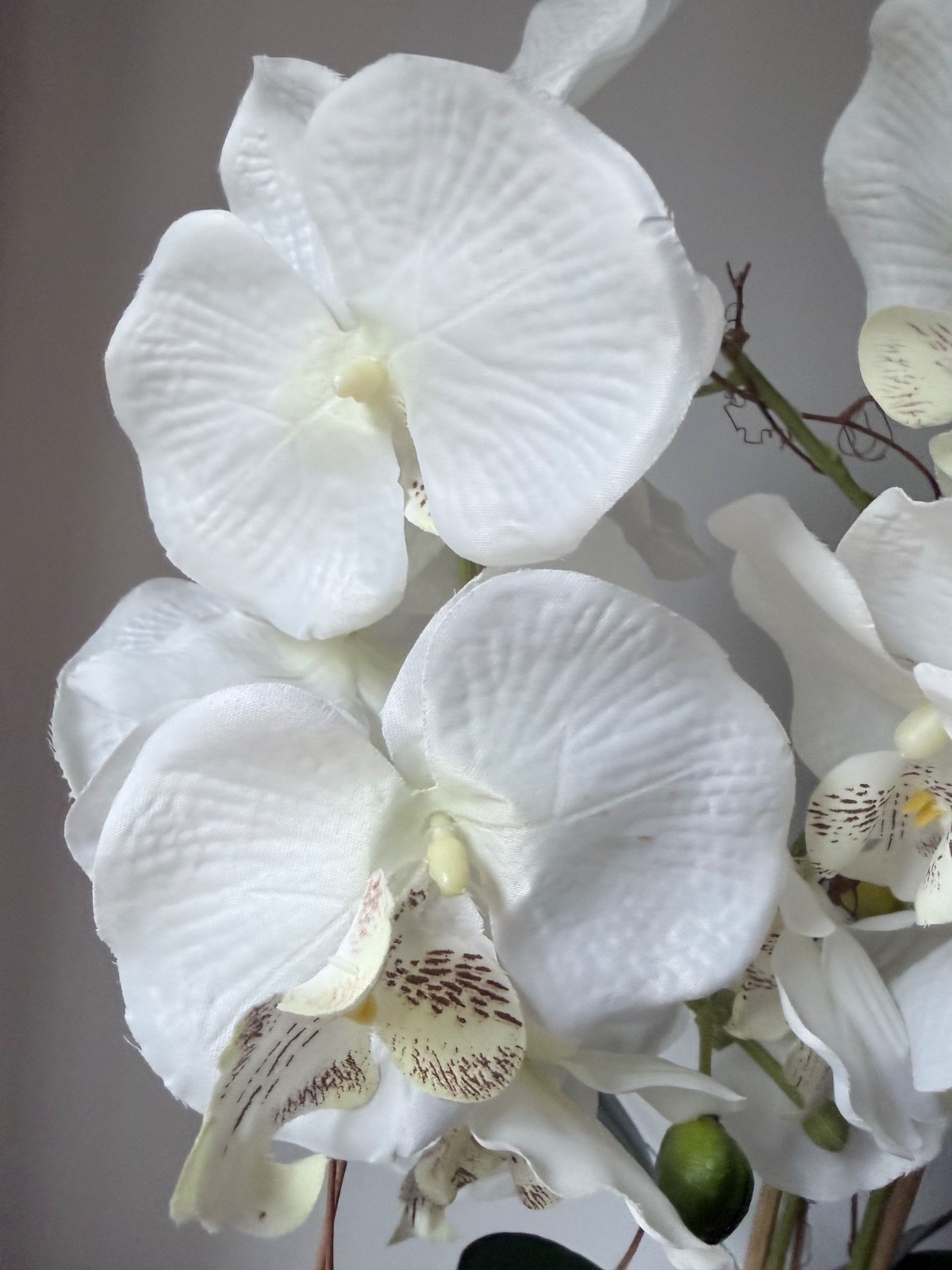 artificial white Phalaenopsis orchid arrangement in a brown textured vase 27”….