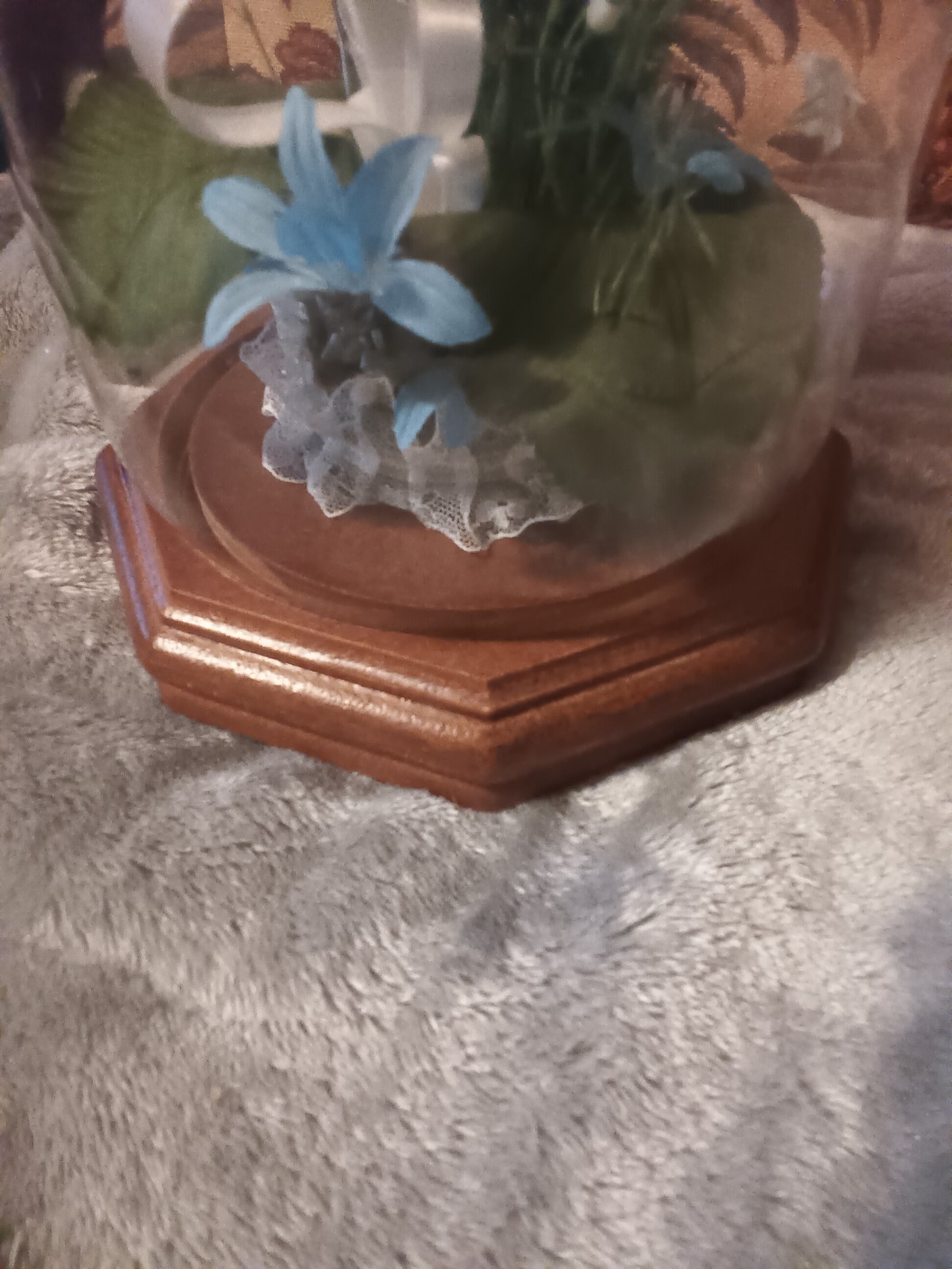 Glass dome blue,green and white artificial flower arrangement,wood base.