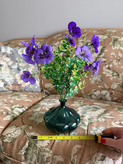Decor Artificial purple flowers in a green glass pumpkin vase, size small