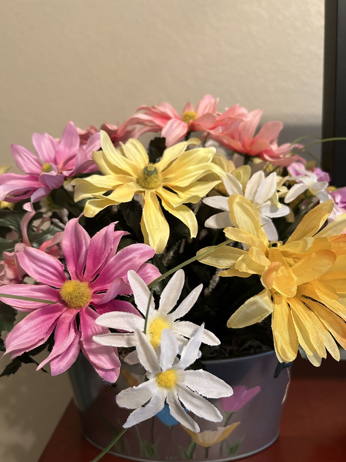 Spring Flower Arrangement in a Silver Metal Canister with Flower and Bee Motif