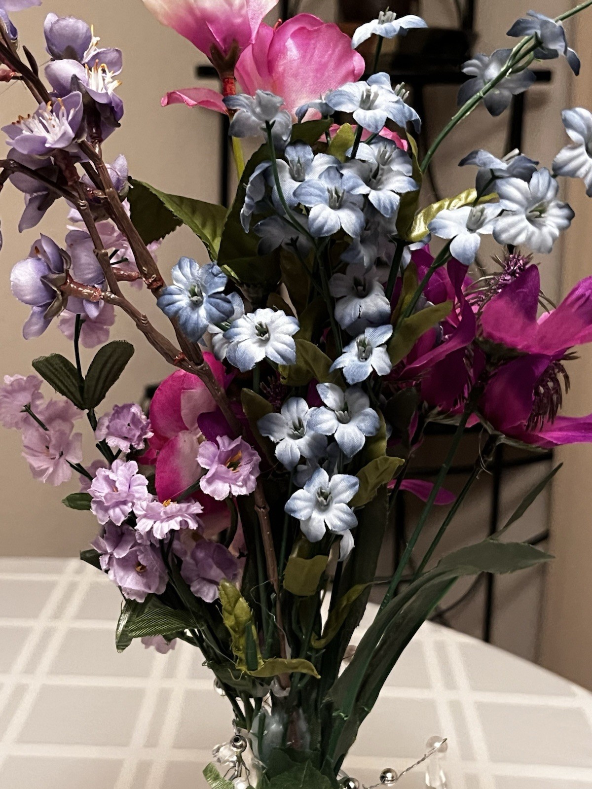 An Elegant Silk Floral Arrangement Stands 19 Inches Tall