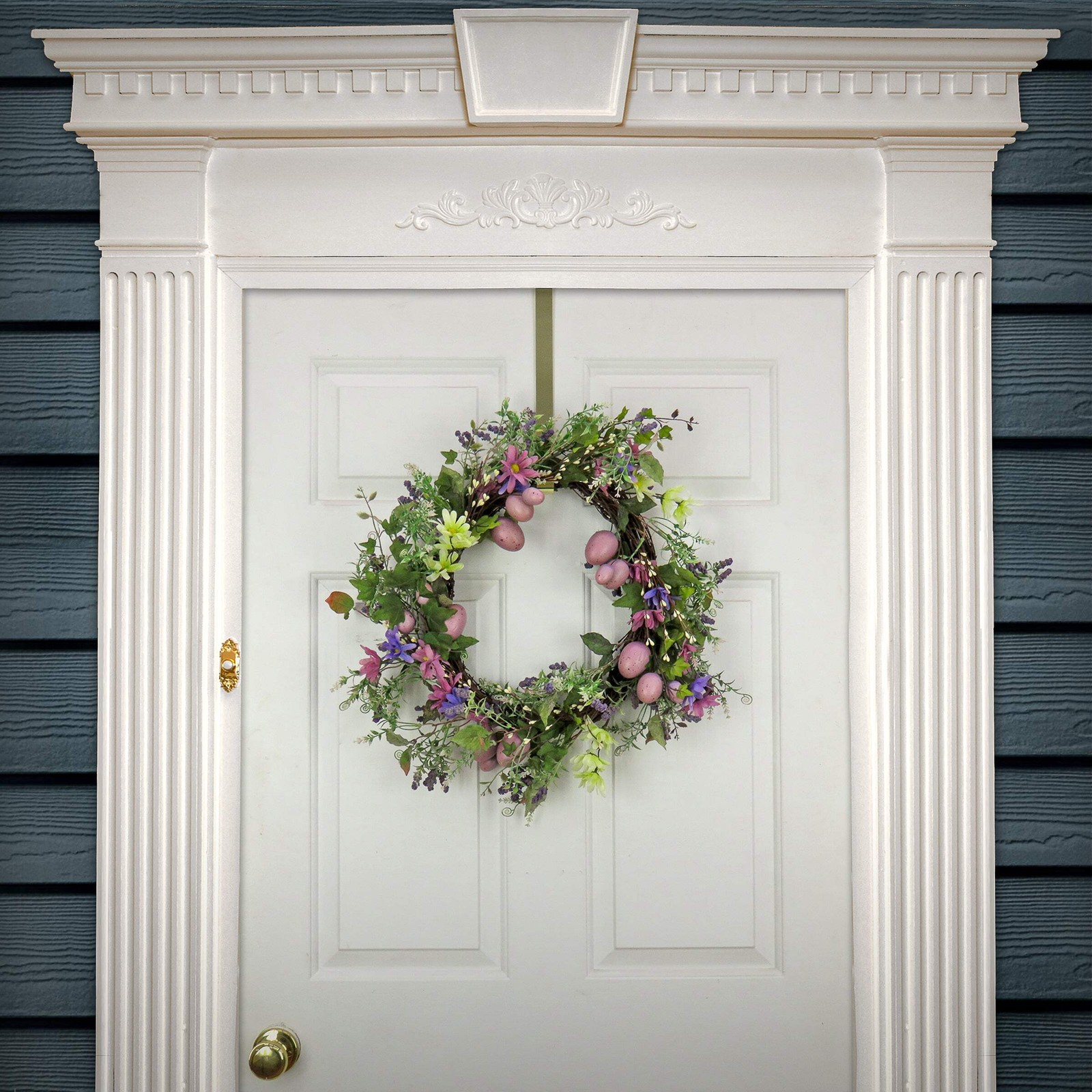 22 in. Easter Wreath Decorated with Purple Pastel Eggs, Pink Flowers, Leafy Gree