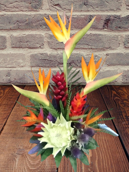 Artificia ltropical floral arrangement