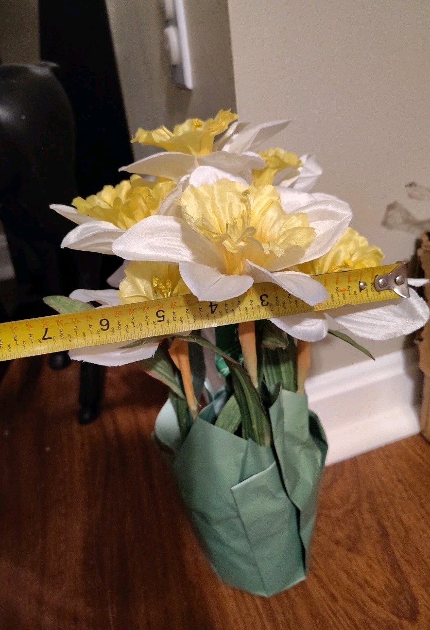 Artificial Yellow And White Daffodils In Pot With Paper