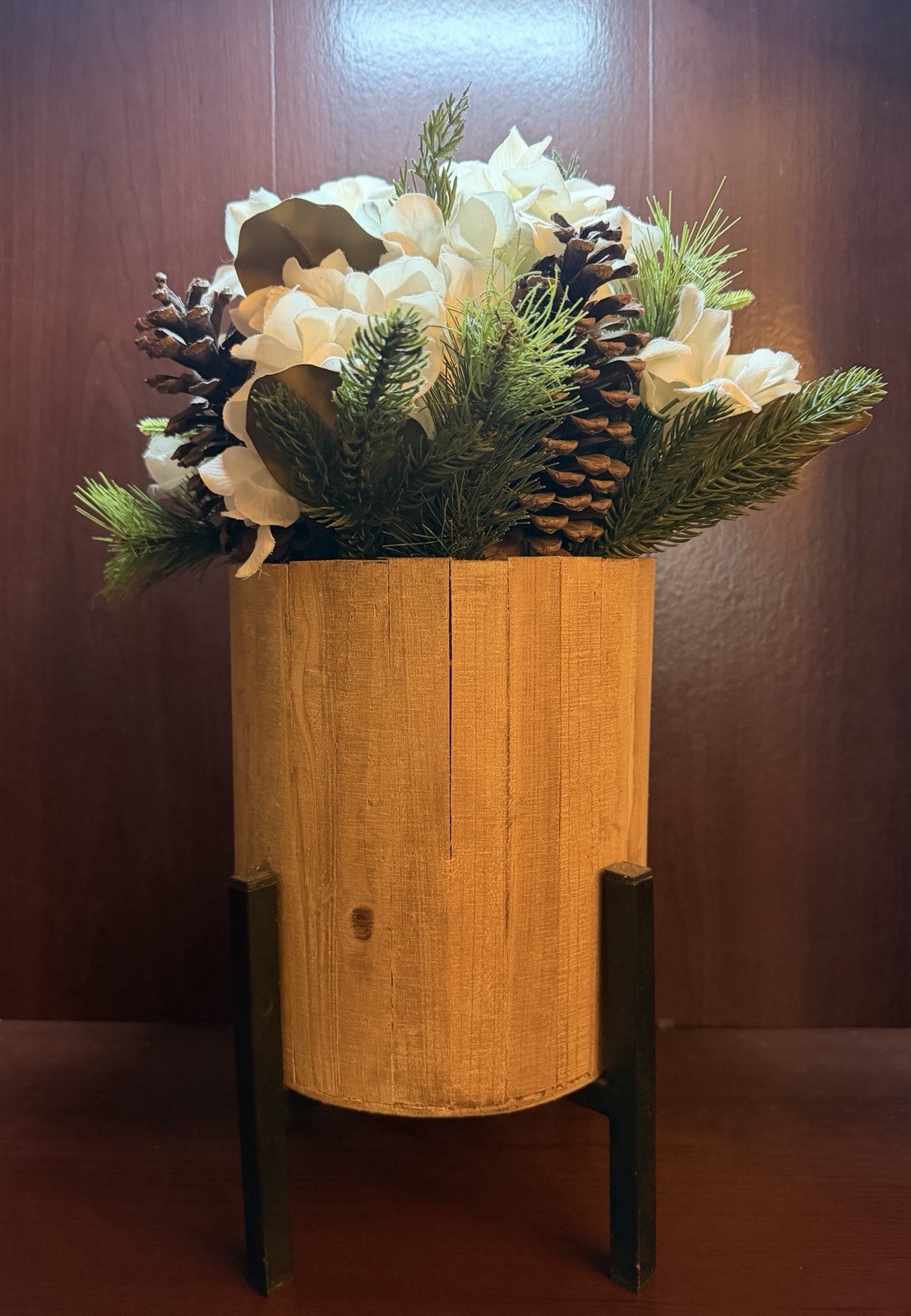 Artificial Pine Plant With White Flowers And Pinecones In Stand