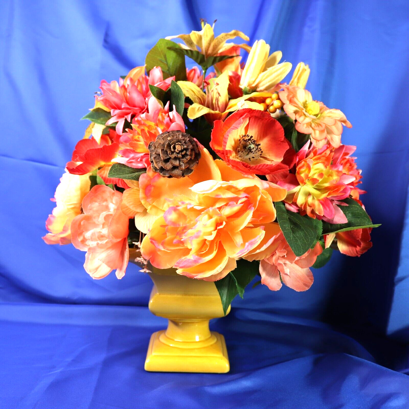 Lovely Floral Arrangement In Shades of Coral Pink & Yellow in a Square Planter