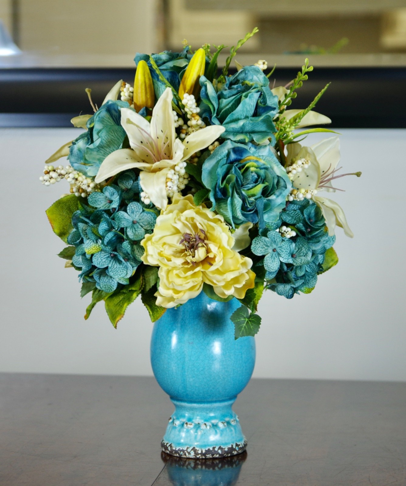 Silk Arrangement of Blue Roses, Hydrangeas and Beige Lilies in Blue Ceramic Vase