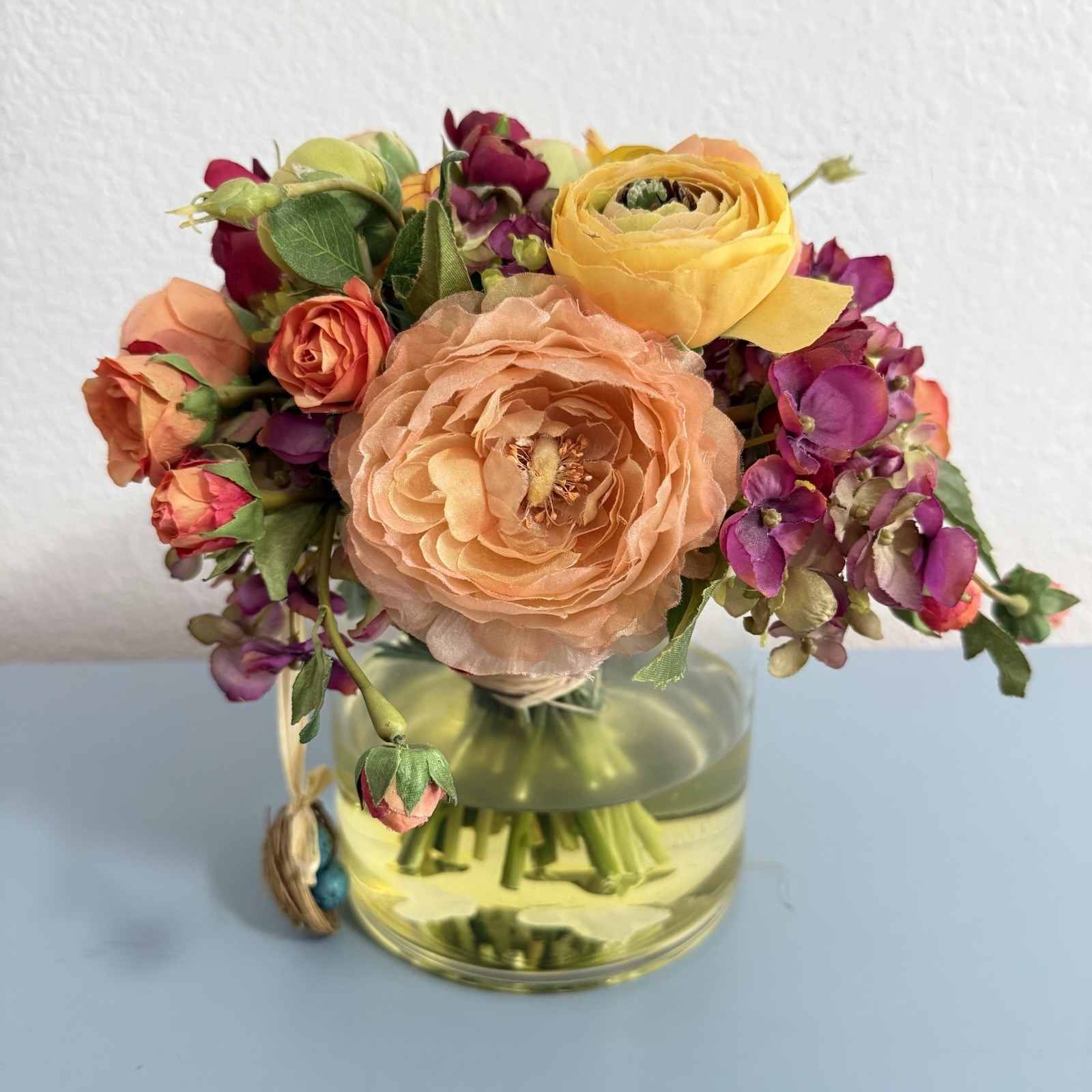 Beautiful Flower Arrangement in Glass Vase with Faux Water.