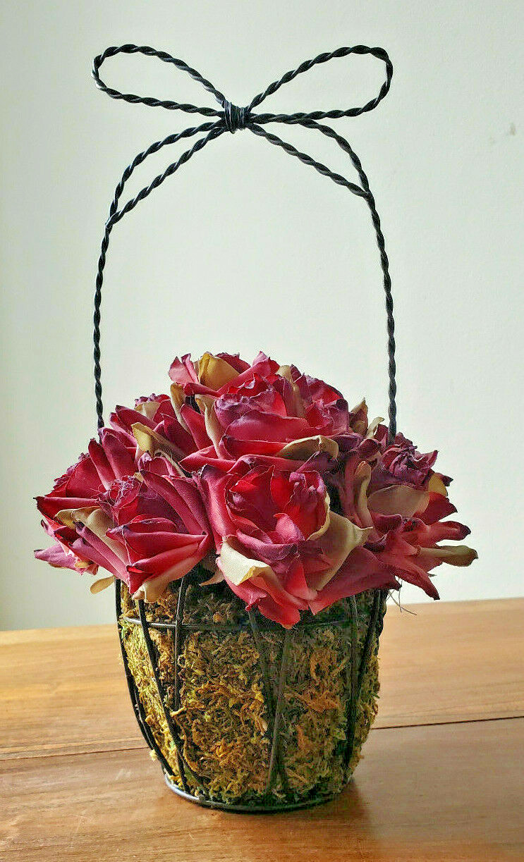 Artificial Fall Bouquet Of Roses In A Black Intertwined Wired Basket