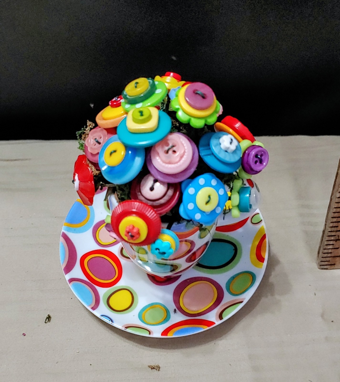 Rainbow Button Bouquet in mini polka dot cup and saucer. only 5 inches tall!